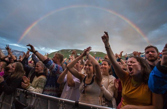 People with rainbow in the back