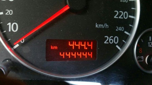 image of 4's on a car's dashboard