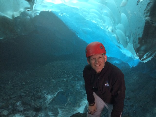 Bo Gulledge in an ice cave under the Mendenhall Glacier, Juneau, Alaska