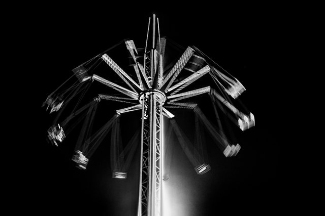 Fairground ride in black and white
