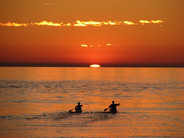 Rowing Into The Sunset