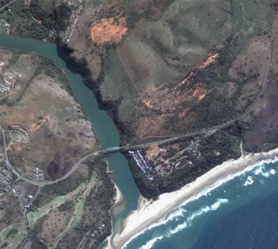 Red desert aerial view with bridge over Umtamvuna River