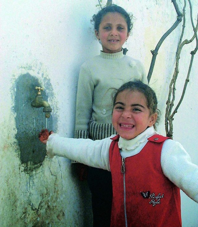 Kids happy to have a tap