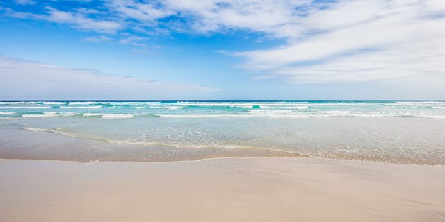 White sandy beach near Puerto Ayora