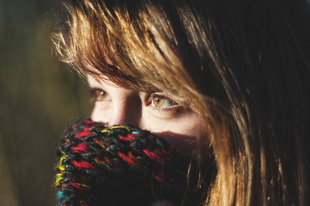 A Smile Beneath A Scarf