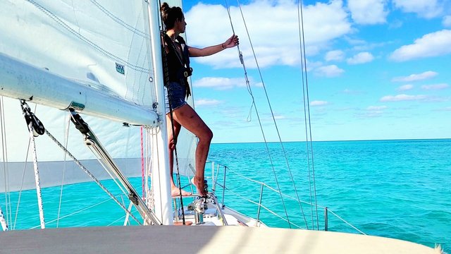solo sailor in the Bahamas with turquoise water on a bucketlist adventure