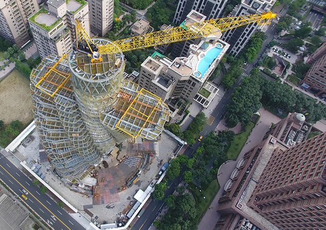 Aerial view of the giant Tao Zhu Yin Yuan green building