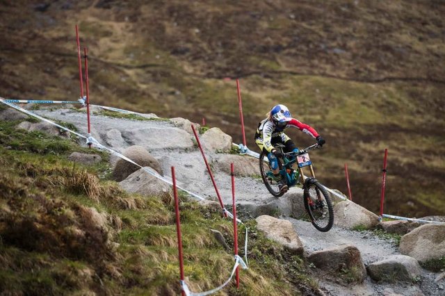 Rachel Atherton blasting her home track—the Fort William 'Off-Beat' Orange (extreme). Photo: Red Bull Content Pool
