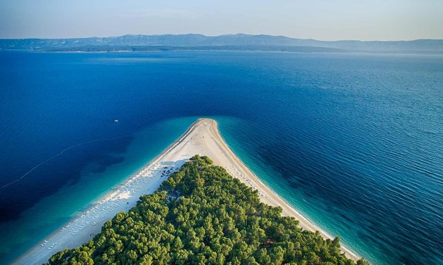 Discover Zlatni Rat Beach in Croatia, one of the most beautiful beaches in the world