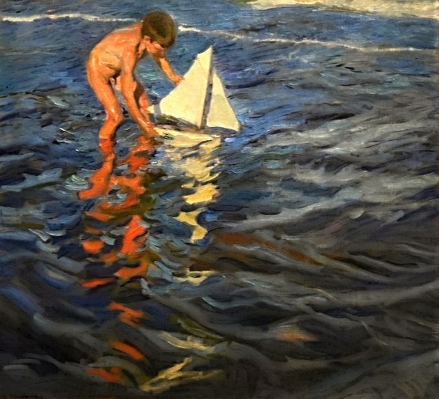 Boy and sailboat
