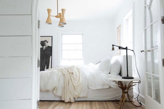 white-washed bedroom decor with modern lighting. / sfgirlbybay