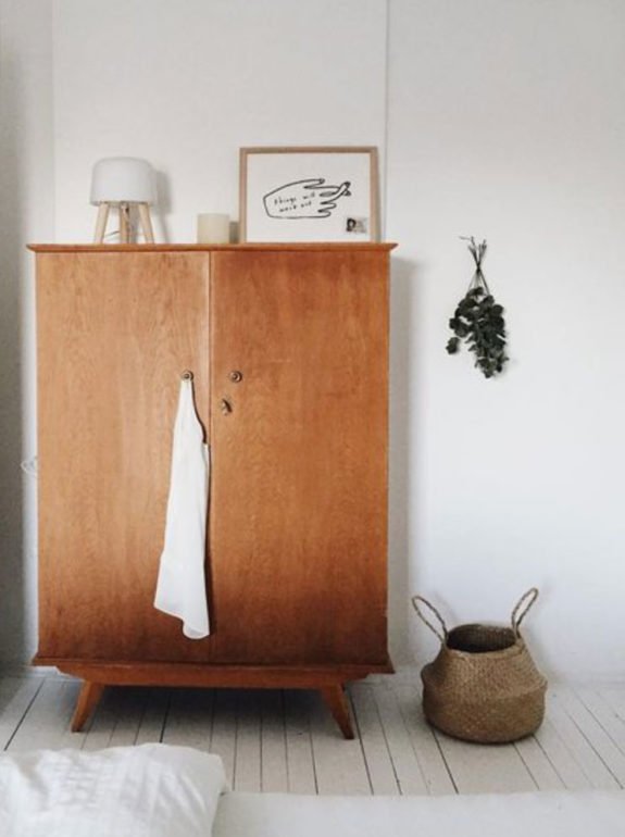 scandinavian-inspired bedroom decor with wood wardrobe cabinet. / sfgirlbybay