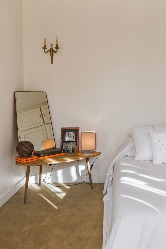 corner bedside table with vintage mirror and light. / sfgirlbybay