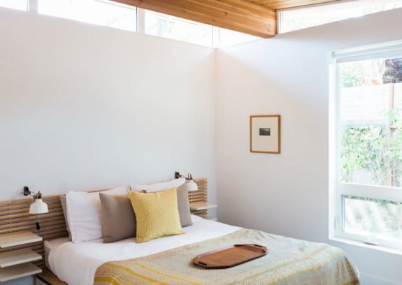 minimalist modern bedroom with yellow and wood details. / sfgirlbybay