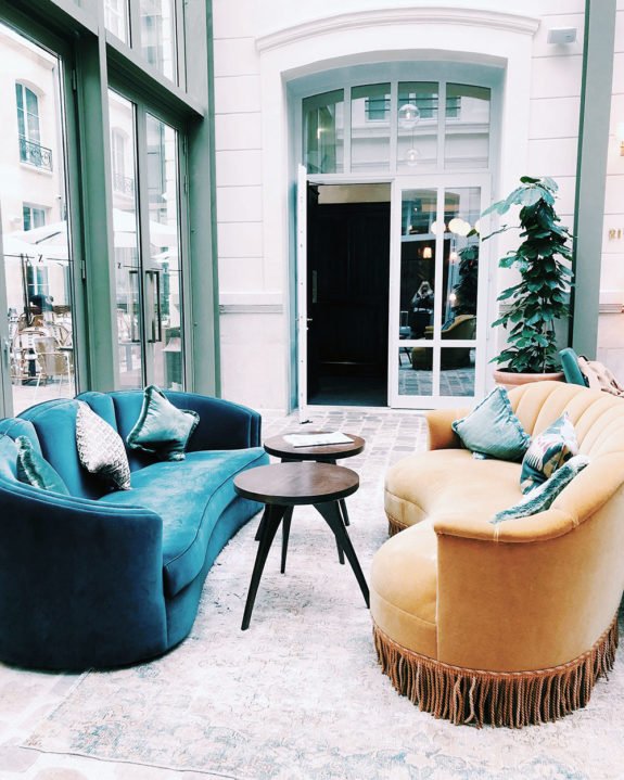 blue and mustard yellow velvet sofas at hoxton hotel in paris. / sfgirlbybay