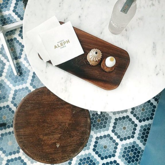 wood tray on marble table over blue tile floors at maison aleph. / sfgirlbybay