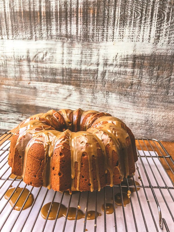 Spiced Brown Sugar Pound Cake with Rum Molasses Glaze is the perfect way to build community! Find the recipe on Shutterbean.com