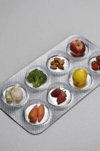 Pill-blister-pack-containing-fruit-and-v