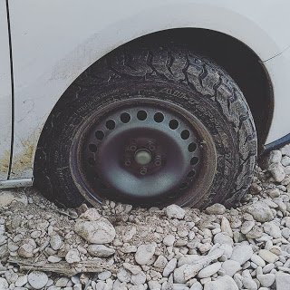 Tire stuck in gravel