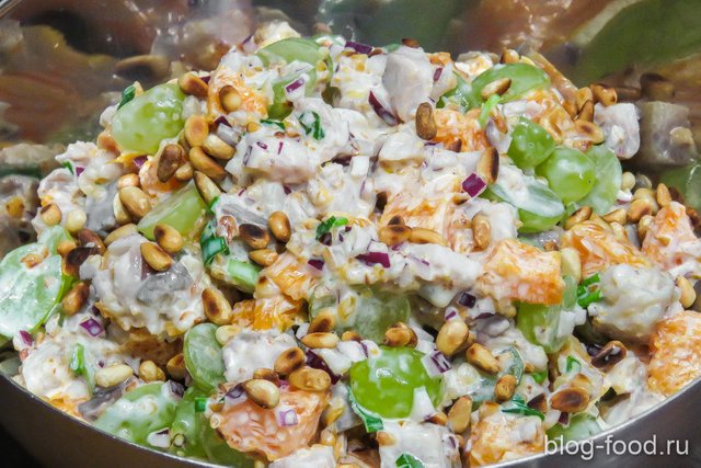 Herring salad with tangerines and grapes