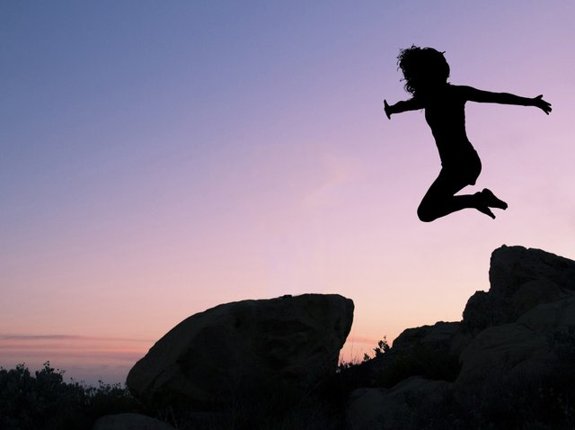 sea outdoor rock silhouette person mountain sky girl woman sunrise sunset morning jump jumping motion female young youth action freedom leap extreme sport movement energy fun happy happiness sports joy leaping joyful active free image jumping for joy free art girl leaping off rock atmosphere of earth