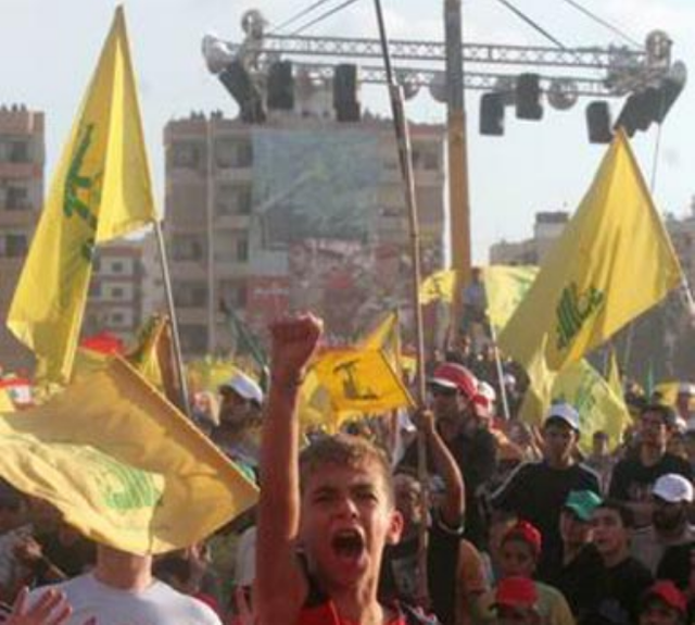 fragment of a picture credited to Yalda Moayeri (یلدا معیری) depicting a child at a Lebanon Hezbollah rally