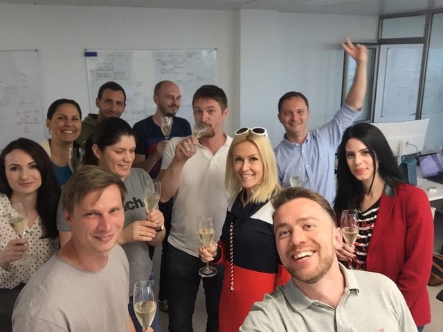 The team celebrates the launch of the Blackmoon Platform