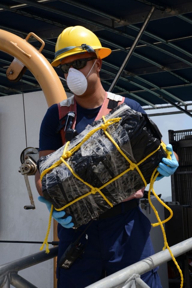 Coast Guard offloads $13.3 million in cocaine, heroin, transfers custody of 2 smugglers, following interdiction in Caribbean Sea