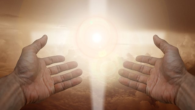 https://pixabay.com/photos/religion-faith-cross-light-hand-3452571/