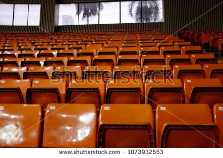 stock-photo-seating-of-an-indoor-basketball-stadium-1073932553.jpg