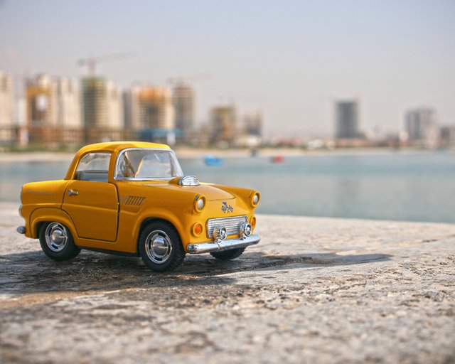 small-yellow-car-on-the-beach_800.jpg