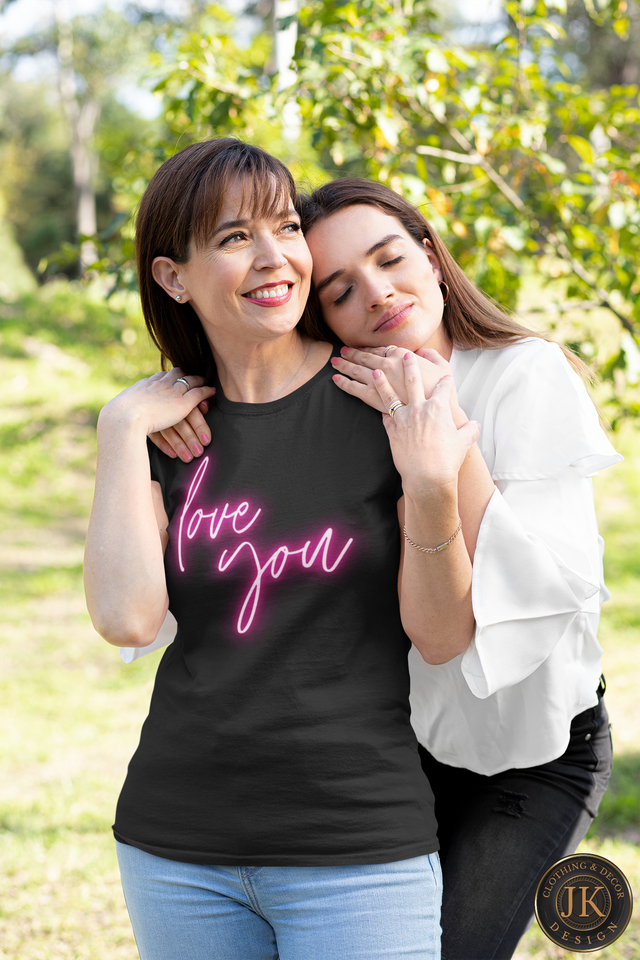 t-shirt-mockup-of-a-woman-smiling-while-her-daughter-hugs-her-32654.png