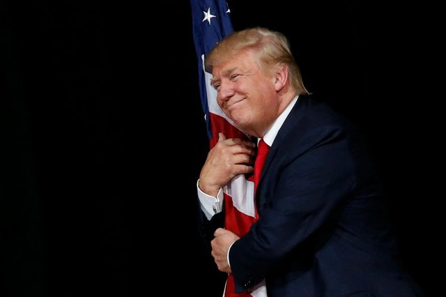 trump-hugging-american-flag.jpg