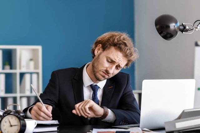 stock-photo-stressed-businessman-trying-meet-deadline.jpg