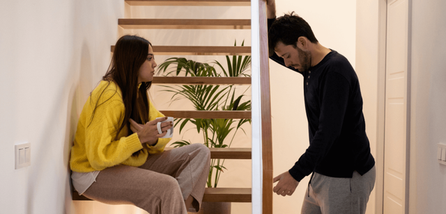 young-couple-looking-serious-in-the-stairs-1024x493-1-1.png