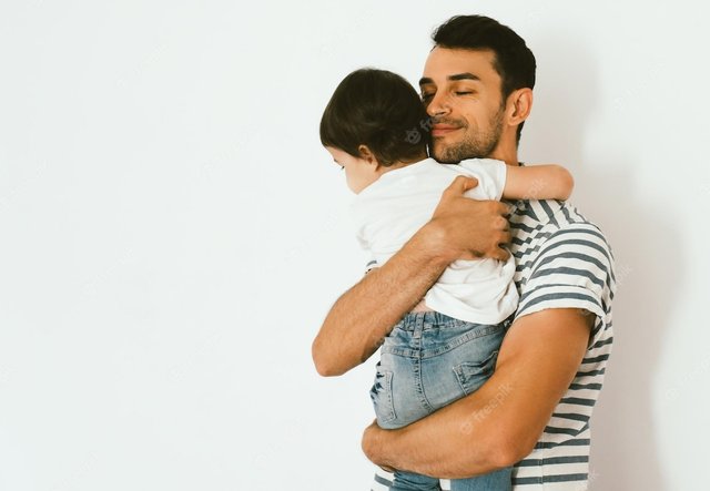 dad-with-closed-eyes-holding-his-beautiful-daughter-against-white-background-good-relationship-parent-child-happy-father-toddler-girl-embrace-together-childhood-fatherhood-care_616427-2729.jpg