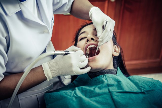 dentists-treat-patients-teeth.jpg