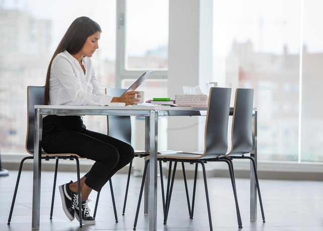 full-shot-woman-sitting-desk_23.jpg