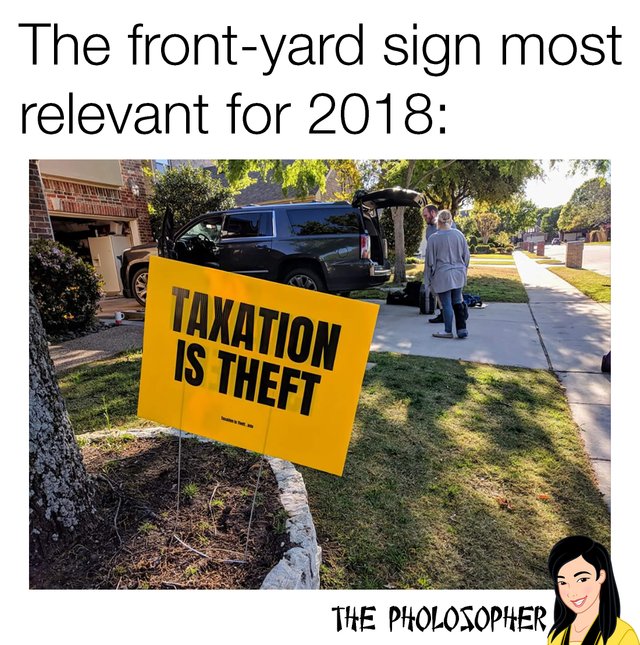 fonrt yard sign taxation is theft.jpg