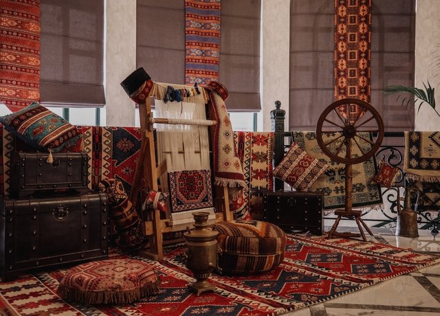 side-view-traditional-rug-being-woven-carpet-vertical-loom-oriental-wall.jpg