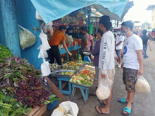 Buying vegetables.jpg