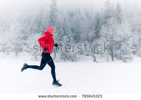 stock-photo-woman-running-on-snow-in-winter-mountains-sport-fitness-inspiration-and-motivation-young-happy-795845323.jpg