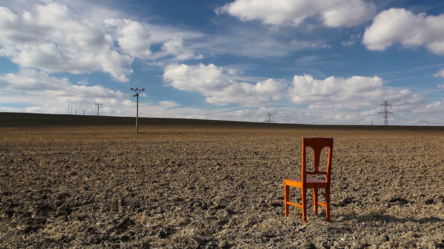 old-wooden-chair-on-the-empty-field-after-harvest_syqeyefh_thumbnail-full01.png