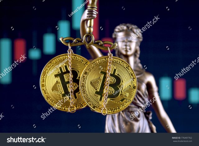 3 - stock-photo-symbol-of-law-and-justice-and-physical-version-of-bitcoin-prohibition-of-cryptocurrencies-776497762.jpg