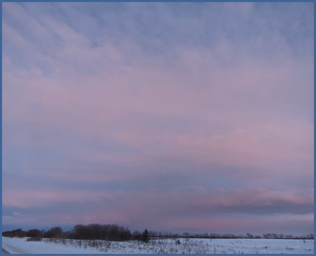 streaked pink and blue pastel sunset in expansive sky.JPG