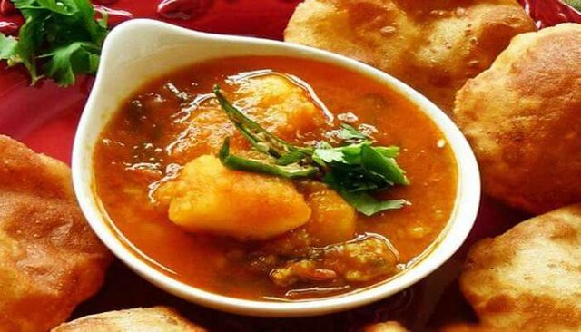 The-yummiest-Delhi-street-food-Poori-Aloo.jpg