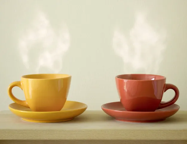 steaming-coffee-cup-table_1373-64.webp