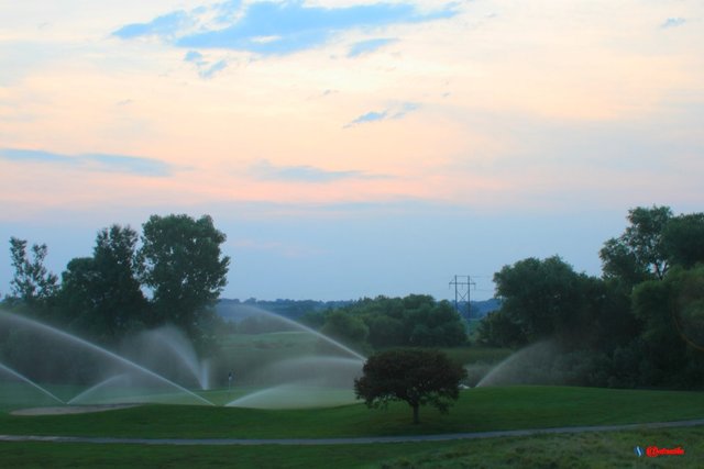 sunrise dawn clouds colorful sprinklers golf course SR0007.JPG