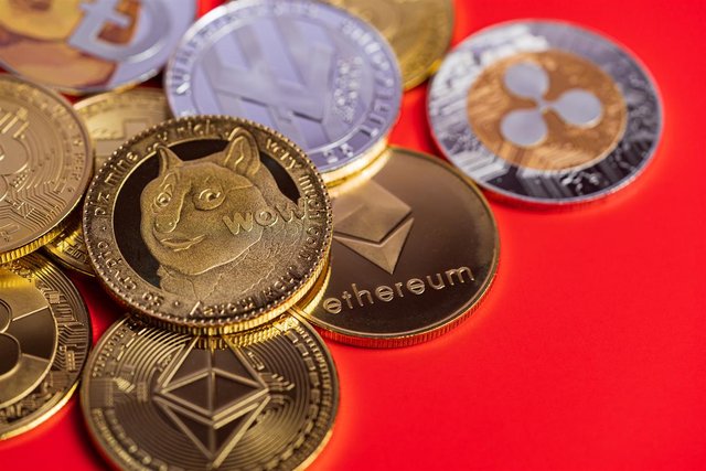 1920-dogecoin-doge-group-included-with-cryptocurrency-coin-bitcoin-ethereum-eth-ripple-coin-xrp-ethereum-classic-etc-symbol-virtual-blockchain-technology-future-is-money-lose-close-up-on-red-background.jpg