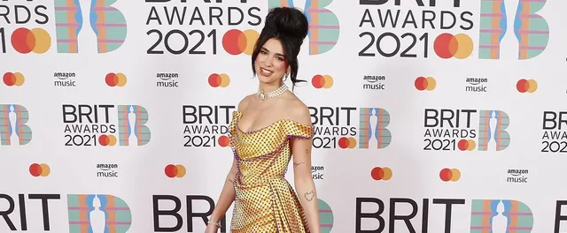 dua-lipa-yellow-dress-at-the-2021-brit-awards.webp